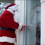Santa impersonator breaking into a house