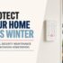 Outdoor security camera covered with light snow on a Michigan home